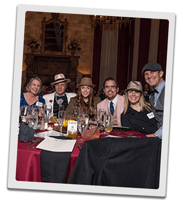 Minneapolis Murder Mystery party guests at the table